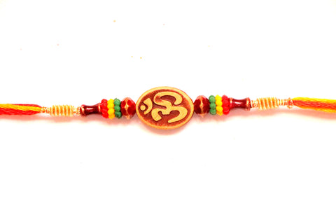 Craved Om Rakhi with beads - OnlinePrasad.com