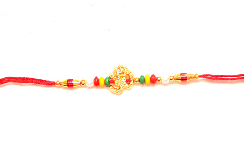 Om Rakhi in gold with beads - OnlinePrasad.com