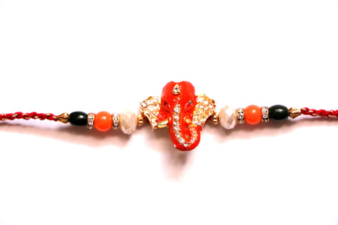 Ganesha rakhi with studded ears and trunk - OnlinePrasad.com